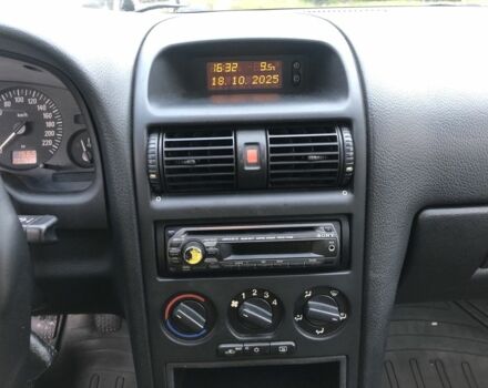 Серый Опель Астра, объемом двигателя 1.4 л и пробегом 207 тыс. км за 3500 $, фото 8 на Automoto.ua