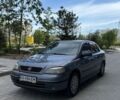 Серый Опель Астра, объемом двигателя 1.4 л и пробегом 180 тыс. км за 2000 $, фото 1 на Automoto.ua