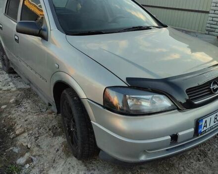 Серый Опель Астра, объемом двигателя 1.4 л и пробегом 400 тыс. км за 2600 $, фото 7 на Automoto.ua