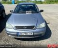 Серый Опель Астра, объемом двигателя 1.4 л и пробегом 200 тыс. км за 2600 $, фото 1 на Automoto.ua