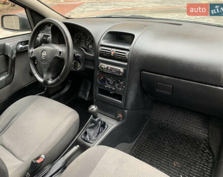 Серый Опель Астра, объемом двигателя 1.4 л и пробегом 216 тыс. км за 2650 $, фото 7 на Automoto.ua