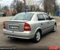 Серый Опель Астра, объемом двигателя 1.4 л и пробегом 250 тыс. км за 2999 $, фото 2 на Automoto.ua