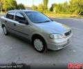 Серый Опель Астра, объемом двигателя 1.4 л и пробегом 178 тыс. км за 4000 $, фото 1 на Automoto.ua