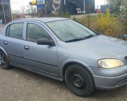 Серый Опель Астра, объемом двигателя 1.4 л и пробегом 250 тыс. км за 3000 $, фото 1 на Automoto.ua