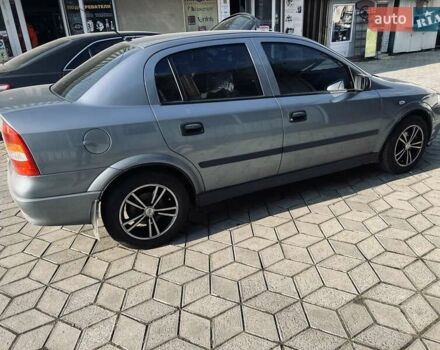 Серый Опель Астра, объемом двигателя 1.4 л и пробегом 173 тыс. км за 5500 $, фото 3 на Automoto.ua