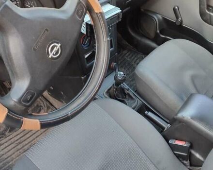 Серый Опель Астра, объемом двигателя 1.4 л и пробегом 400 тыс. км за 2600 $, фото 3 на Automoto.ua