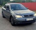 Серый Опель Астра, объемом двигателя 1.4 л и пробегом 300 тыс. км за 3100 $, фото 1 на Automoto.ua