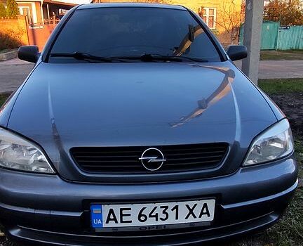 Серый Опель Астра, объемом двигателя 1.4 л и пробегом 285 тыс. км за 4200 $, фото 2 на Automoto.ua