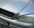 Серый Опель Астра, объемом двигателя 1.4 л и пробегом 211 тыс. км за 3200 $, фото 6 на Automoto.ua