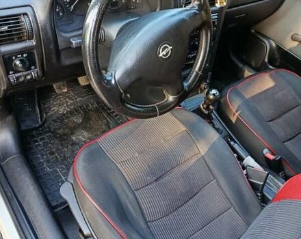 Серый Опель Астра, объемом двигателя 1.4 л и пробегом 342 тыс. км за 2200 $, фото 1 на Automoto.ua