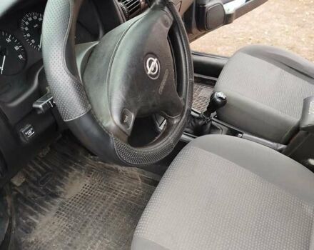 Серый Опель Астра, объемом двигателя 1.6 л и пробегом 180 тыс. км за 4200 $, фото 4 на Automoto.ua