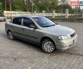 Серый Опель Астра, объемом двигателя 1.4 л и пробегом 168 тыс. км за 3800 $, фото 6 на Automoto.ua
