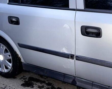 Серый Опель Астра, объемом двигателя 1.4 л и пробегом 140 тыс. км за 4500 $, фото 6 на Automoto.ua