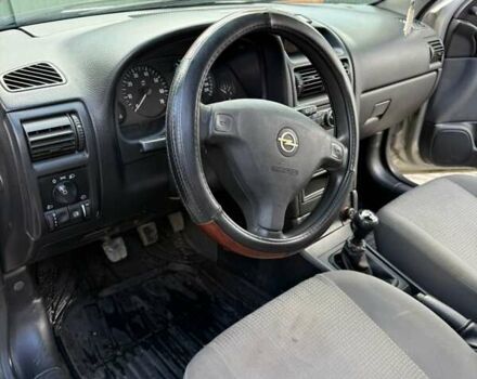 Серый Опель Астра, объемом двигателя 1.4 л и пробегом 211 тыс. км за 3200 $, фото 15 на Automoto.ua