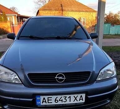 Серый Опель Астра, объемом двигателя 1.4 л и пробегом 285 тыс. км за 4200 $, фото 2 на Automoto.ua