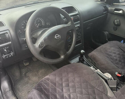 Серый Опель Астра, объемом двигателя 1.4 л и пробегом 279 тыс. км за 4300 $, фото 4 на Automoto.ua