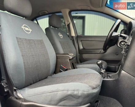 Серый Опель Астра, объемом двигателя 1.4 л и пробегом 188 тыс. км за 3800 $, фото 11 на Automoto.ua