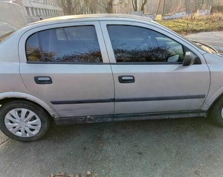 Серый Опель Астра, объемом двигателя 1.4 л и пробегом 342 тыс. км за 2200 $, фото 3 на Automoto.ua