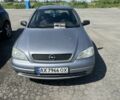 Серый Опель Астра, объемом двигателя 1.4 л и пробегом 200 тыс. км за 2650 $, фото 1 на Automoto.ua