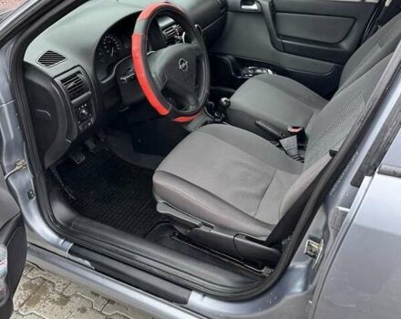 Серый Опель Астра, объемом двигателя 1.6 л и пробегом 314 тыс. км за 2999 $, фото 14 на Automoto.ua