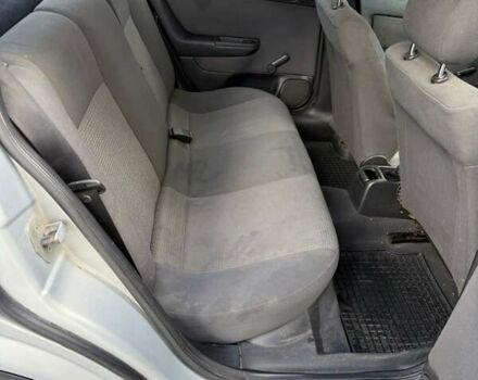 Серый Опель Астра, объемом двигателя 1.4 л и пробегом 211 тыс. км за 3200 $, фото 12 на Automoto.ua