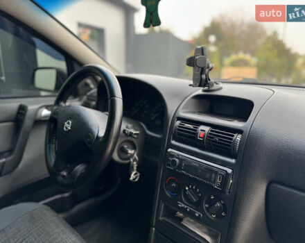 Серый Опель Астра, объемом двигателя 1.4 л и пробегом 188 тыс. км за 3800 $, фото 9 на Automoto.ua