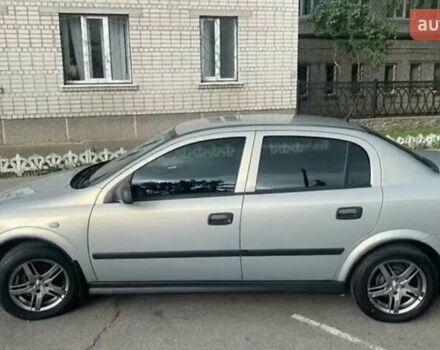 Серый Опель Астра, объемом двигателя 1.6 л и пробегом 59 тыс. км за 6999 $, фото 2 на Automoto.ua