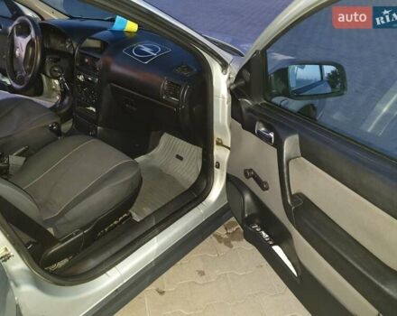 Серый Опель Астра, объемом двигателя 1.4 л и пробегом 240 тыс. км за 4200 $, фото 2 на Automoto.ua