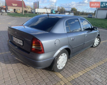 Серый Опель Астра, объемом двигателя 1.4 л и пробегом 266 тыс. км за 4500 $, фото 1 на Automoto.ua