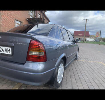 Серый Опель Астра, объемом двигателя 1.4 л и пробегом 266 тыс. км за 4500 $, фото 3 на Automoto.ua