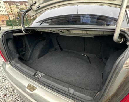 Серый Опель Астра, объемом двигателя 1.6 л и пробегом 283 тыс. км за 4000 $, фото 12 на Automoto.ua