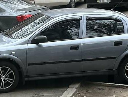 Серый Опель Астра, объемом двигателя 1.4 л и пробегом 173 тыс. км за 5500 $, фото 2 на Automoto.ua