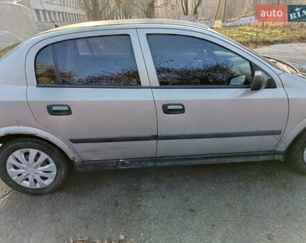 Серый Опель Астра, объемом двигателя 1.4 л и пробегом 342 тыс. км за 2200 $, фото 2 на Automoto.ua