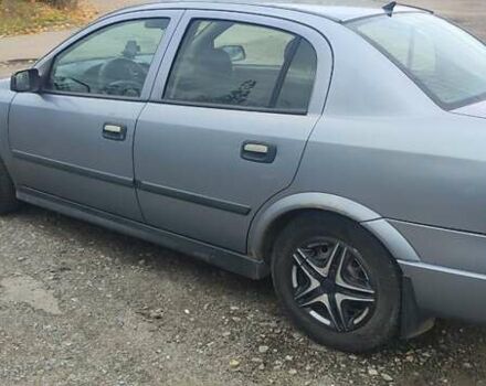 Серый Опель Астра, объемом двигателя 1.4 л и пробегом 250 тыс. км за 3000 $, фото 3 на Automoto.ua