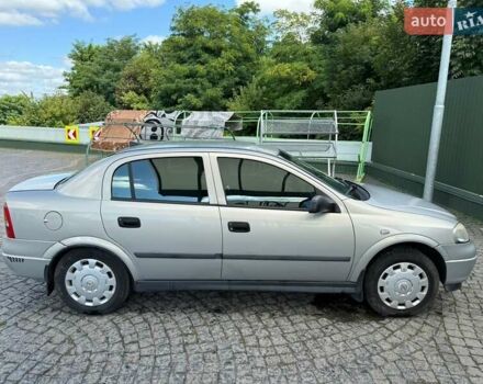 Серый Опель Астра, объемом двигателя 1.4 л и пробегом 211 тыс. км за 3200 $, фото 3 на Automoto.ua