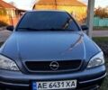 Серый Опель Астра, объемом двигателя 1.4 л и пробегом 285 тыс. км за 4200 $, фото 9 на Automoto.ua