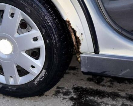 Серый Опель Астра, объемом двигателя 1.4 л и пробегом 140 тыс. км за 4500 $, фото 7 на Automoto.ua