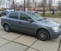 Серый Опель Астра, объемом двигателя 1.6 л и пробегом 172 тыс. км за 3800 $, фото 5 на Automoto.ua