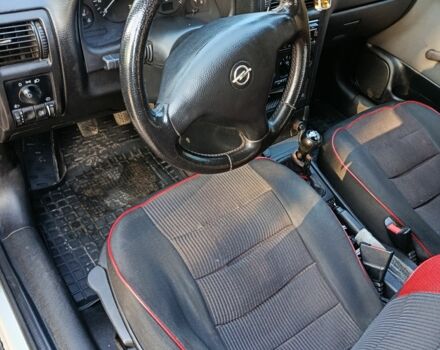 Серый Опель Астра, объемом двигателя 1.4 л и пробегом 342 тыс. км за 2200 $, фото 2 на Automoto.ua