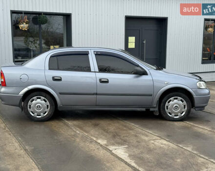 Серый Опель Астра, объемом двигателя 1.4 л и пробегом 188 тыс. км за 3800 $, фото 7 на Automoto.ua