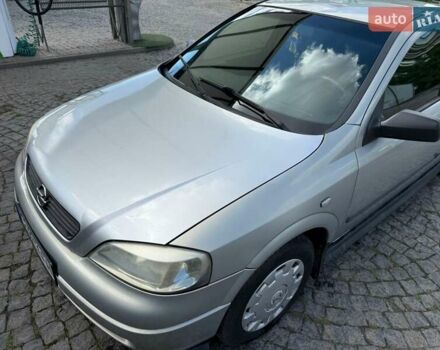 Серый Опель Астра, объемом двигателя 1.4 л и пробегом 211 тыс. км за 3200 $, фото 7 на Automoto.ua