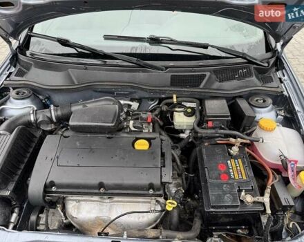 Серый Опель Астра, объемом двигателя 1.6 л и пробегом 314 тыс. км за 2999 $, фото 6 на Automoto.ua