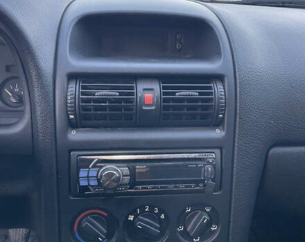 Серый Опель Астра, объемом двигателя 1.4 л и пробегом 293 тыс. км за 3600 $, фото 8 на Automoto.ua