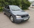 Серый Опель Астра, объемом двигателя 1.4 л и пробегом 249 тыс. км за 3500 $, фото 1 на Automoto.ua