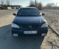 Серый Опель Астра, объемом двигателя 1.4 л и пробегом 225 тыс. км за 3650 $, фото 2 на Automoto.ua