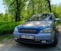Серый Опель Астра, объемом двигателя 1.6 л и пробегом 248 тыс. км за 3900 $, фото 1 на Automoto.ua