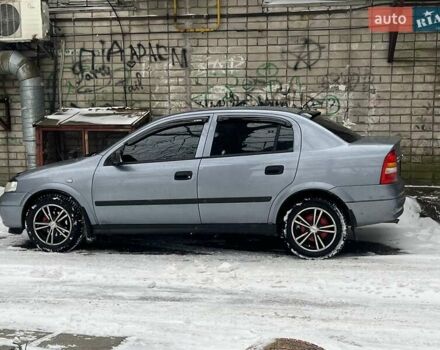 Серый Опель Астра, объемом двигателя 1.4 л и пробегом 173 тыс. км за 5500 $, фото 1 на Automoto.ua