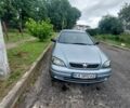 Серый Опель Астра, объемом двигателя 1.4 л и пробегом 150 тыс. км за 4200 $, фото 2 на Automoto.ua