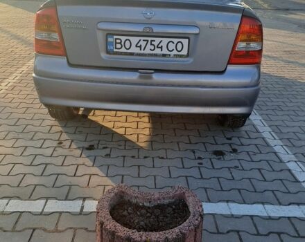 Серый Опель Астра, объемом двигателя 1.4 л и пробегом 173 тыс. км за 2900 $, фото 7 на Automoto.ua