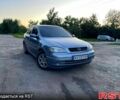 Серый Опель Астра, объемом двигателя 1.6 л и пробегом 349 тыс. км за 3400 $, фото 1 на Automoto.ua